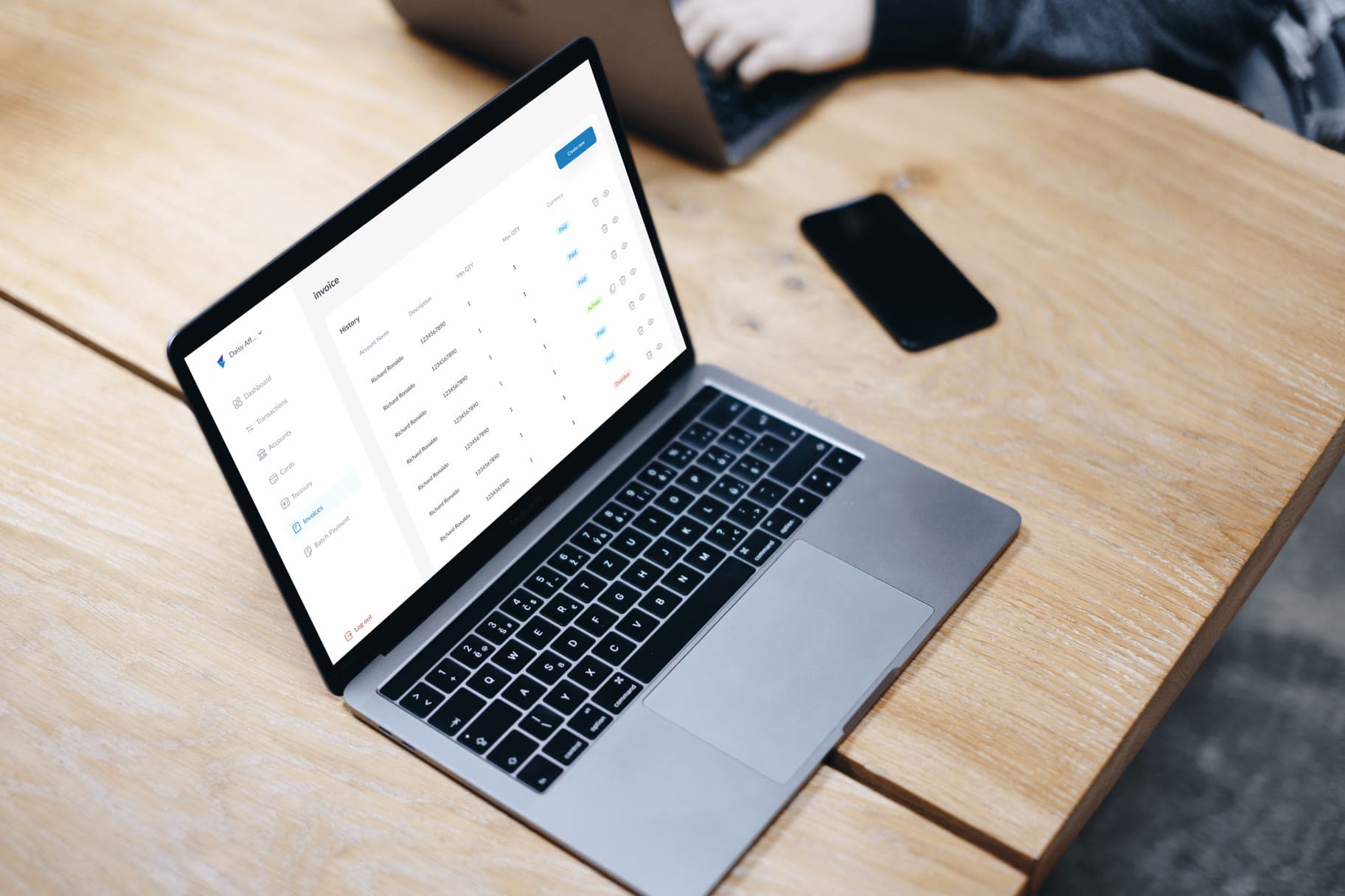 Syka invoice history open on a laptop
