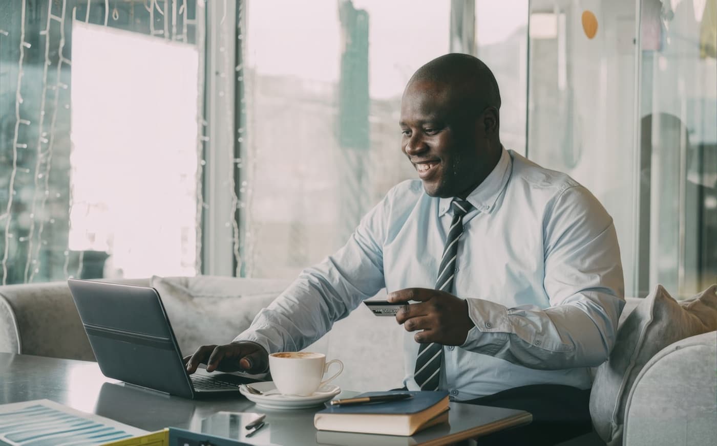 Business owner paying with a Syka virtual card